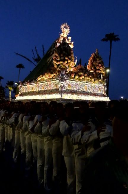 Fuengirola Virgen del Carmen festival in Los Boliches, float bearers carrying the Virgin