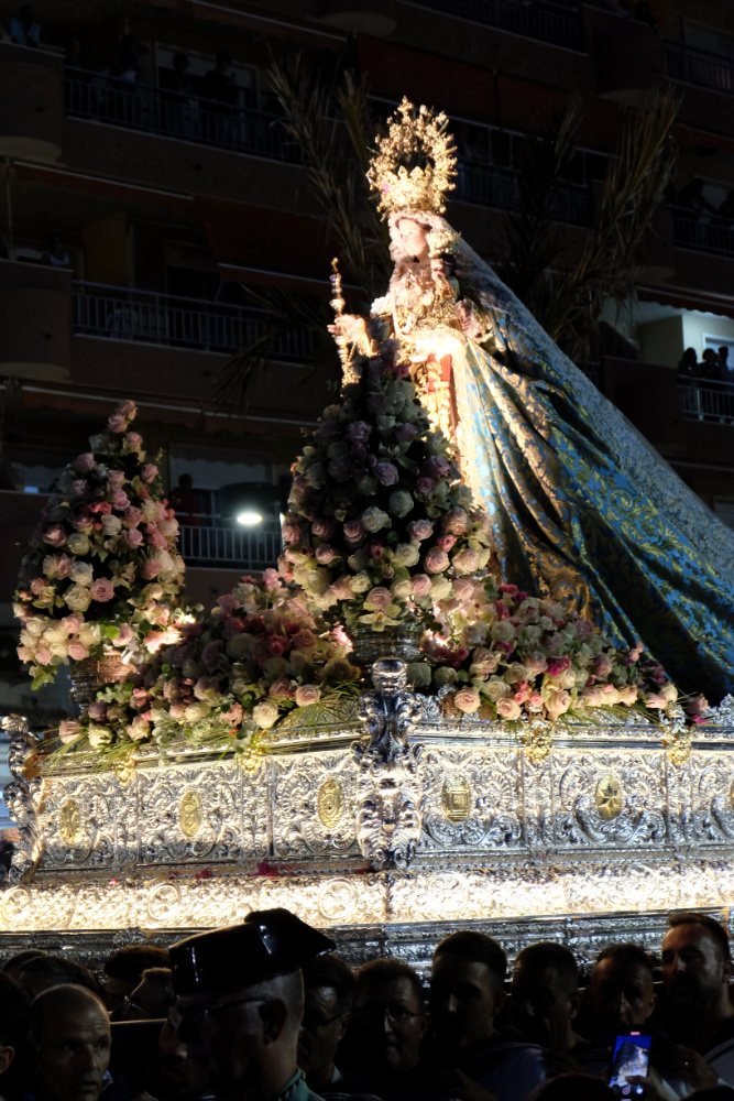 Fuengirola Virgen del Carmen festival in Los Boliches, a close up of the Virgin on the float